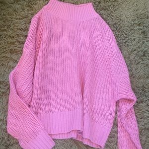 pink knit turtleneck sweater